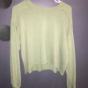 green crew neck sweater